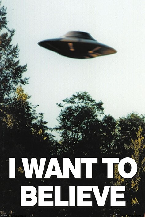 A flying saucer above a forest with the words ‘I want to believe’.