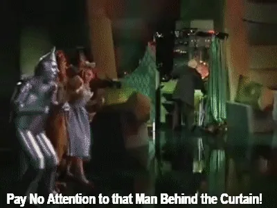 Animated scene from The Wizard of Oz in which the man behind the curtain is exposed.